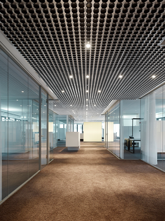 Commercial office remodel with modern ceiling panels and open layout