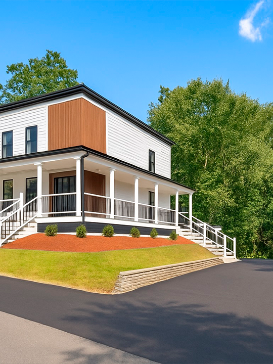 Exterior of fully renovated flip house with new siding and updated porch