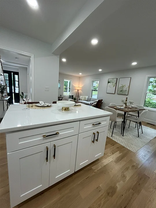Open-concept kitchen remodeling project with bright finishes
